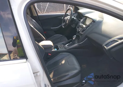 2014 Ford Focus Titanium из США, поврежденный, VIN 1FADP3J21EL367595